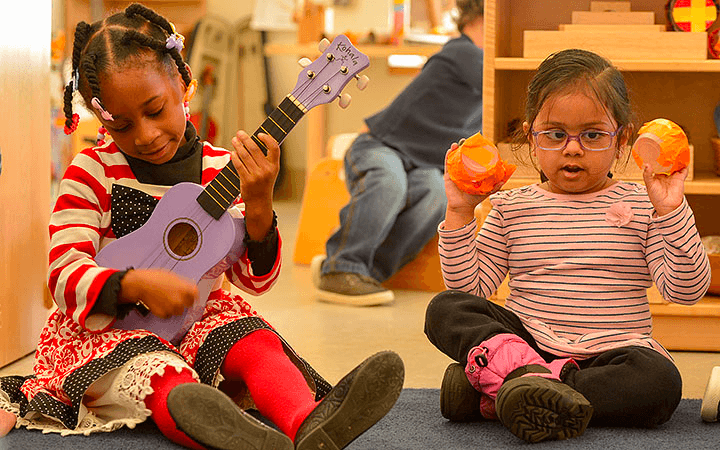 Children playing with musical instruments